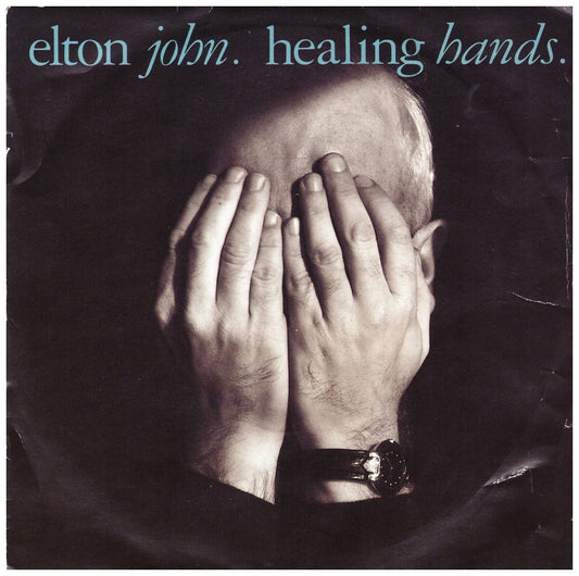 7" 45RPM Healing Hands/Dancing In The End Zone by Elton John from The Rocket Record Company