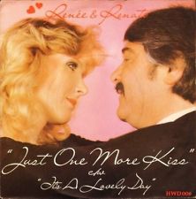 7" 45RPM Just One More Kiss/It's A Lovely Day by Renee And Renato from Hollywood Records