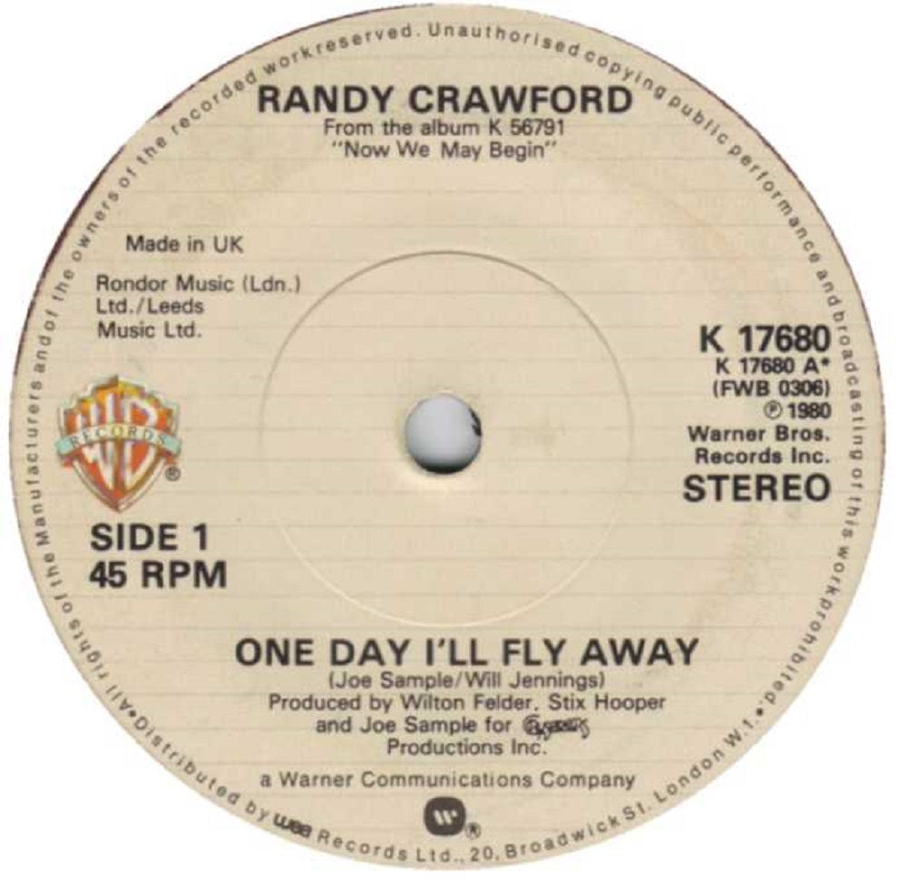 7" 45RPM One Day I'll Fly Away/Blue Flame by Randy Crawford from Warner Bros Records