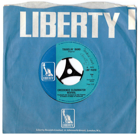 7" 45RPM Travelin' Band/Who'll Stop The Rain by Creedence Clearwater Revival from Liberty